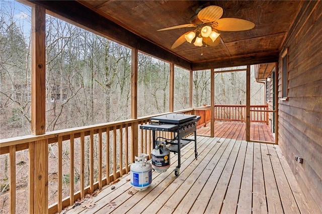 wooden deck with ceiling fan