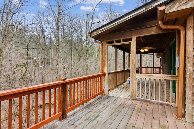 wooden deck with ceiling fan