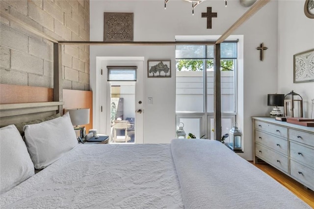 bedroom with wood finished floors