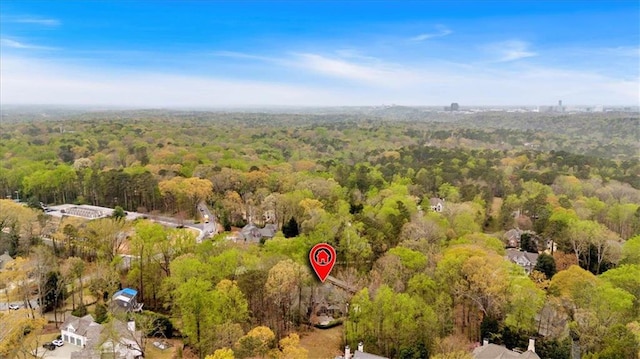 bird's eye view featuring a view of trees
