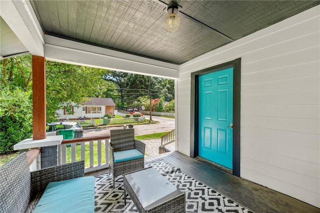 entrance to property with a porch