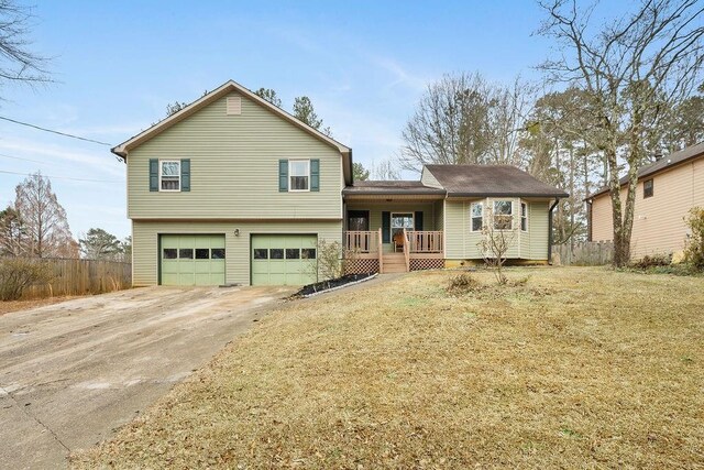 view of front facade with a porch and a garage