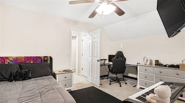 carpeted bedroom with ceiling fan and lofted ceiling