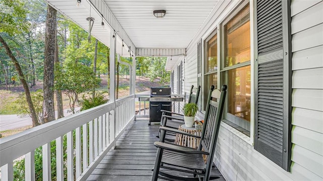 wooden deck with area for grilling