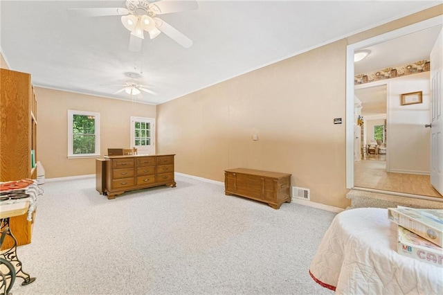 479 Deerpath Dr, Sautee Nacoochee, GA 30571 - bedroom with light colored carpet and a ceiling fan