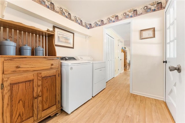 479 Deerpath Dr, Sautee Nacoochee, GA 30571 - laundry room with washer and clothes dryer and light wood-style floors