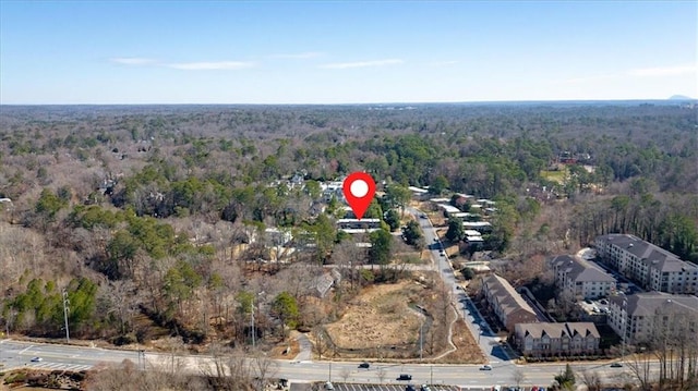 aerial view with a wooded view