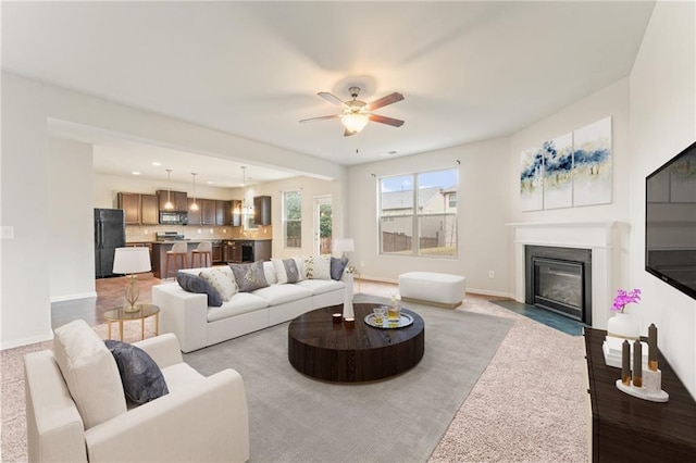 living room featuring ceiling fan