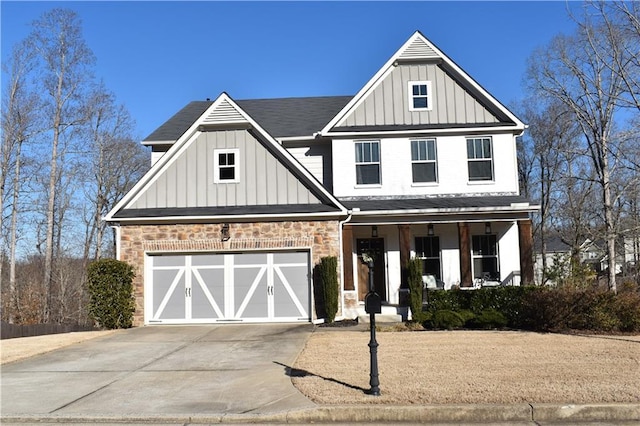 view of front facade with a porch and a garage