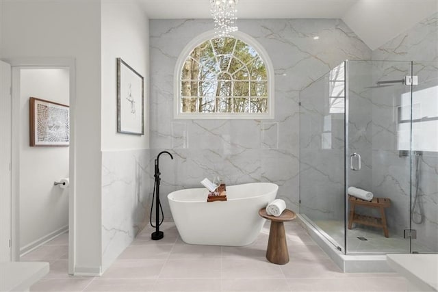 bathroom with separate shower and tub