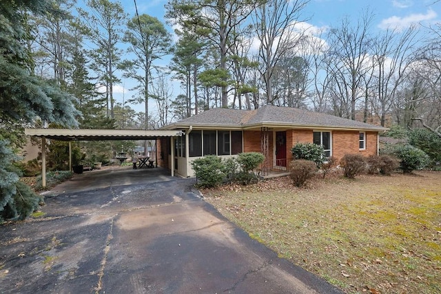 view of front of house featuring a carport