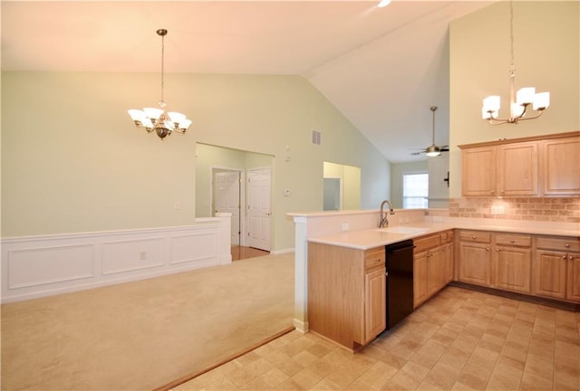 179 Camry Ln, Grayson, GA 30017 - kitchen with a chandelier, black dishwasher, a sink, light brown cabinetry, and high vaulted ceiling