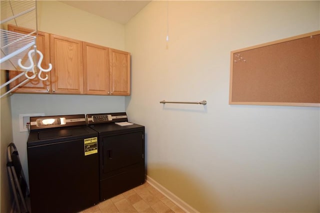 179 Camry Ln, Grayson, GA 30017 - laundry room with washing machine and clothes dryer, cabinet space, and baseboards