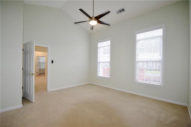 179 Camry Ln, Grayson, GA 30017 - empty room with light colored carpet, a ceiling fan, baseboards, and high vaulted ceiling
