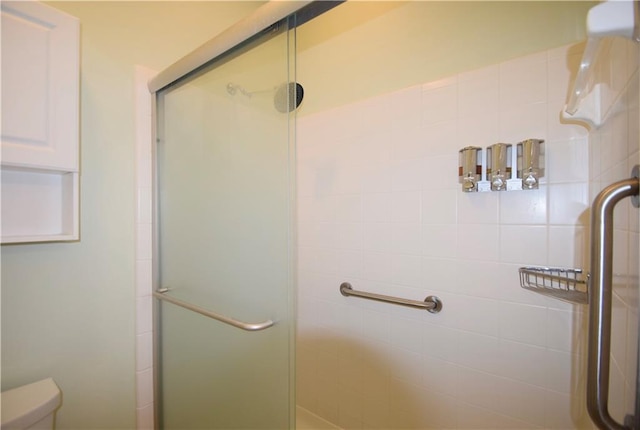 179 Camry Ln, Grayson, GA 30017 - bathroom with a shower stall and toilet