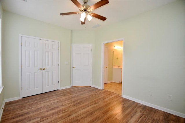179 Camry Ln, Grayson, GA 30017 - unfurnished bedroom with light wood-type flooring, a closet, baseboards, and ceiling fan
