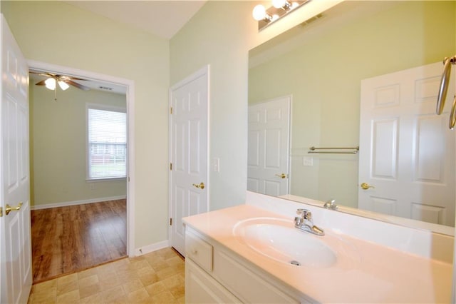 179 Camry Ln, Grayson, GA 30017 - bathroom with vanity, baseboards, and ceiling fan