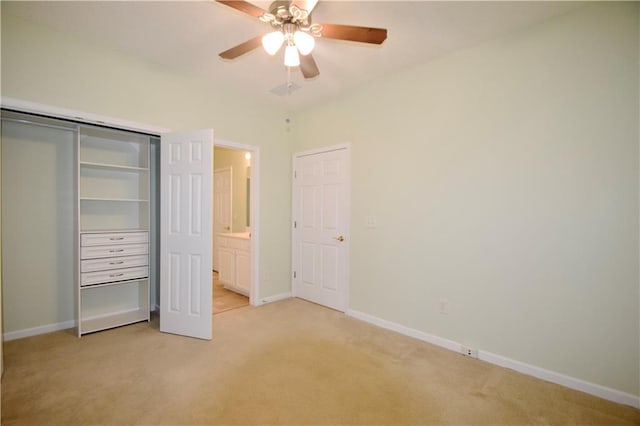179 Camry Ln, Grayson, GA 30017 - unfurnished bedroom with light colored carpet, baseboards, a closet, and a ceiling fan