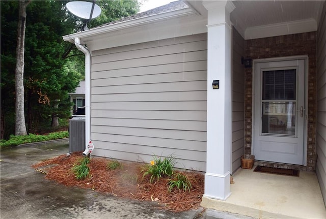 179 Camry Ln, Grayson, GA 30017 - view of exterior entry with central AC unit