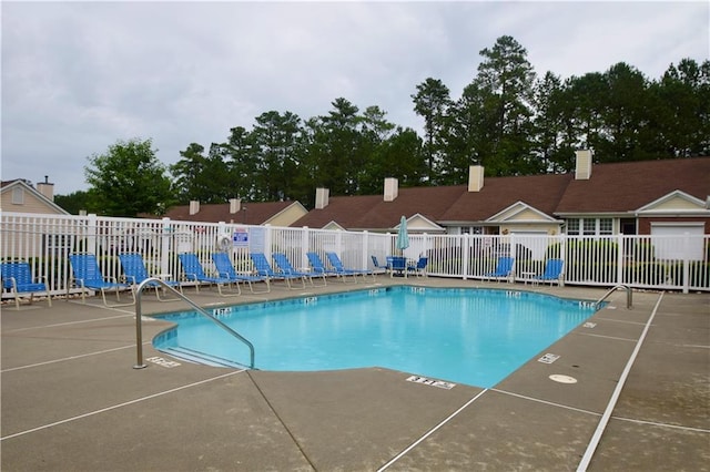 179 Camry Ln, Grayson, GA 30017 - community pool with a patio area