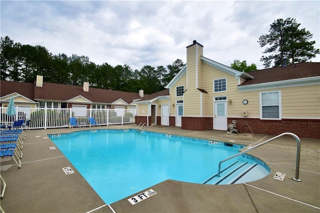 179 Camry Ln, Grayson, GA 30017 - community pool featuring a patio