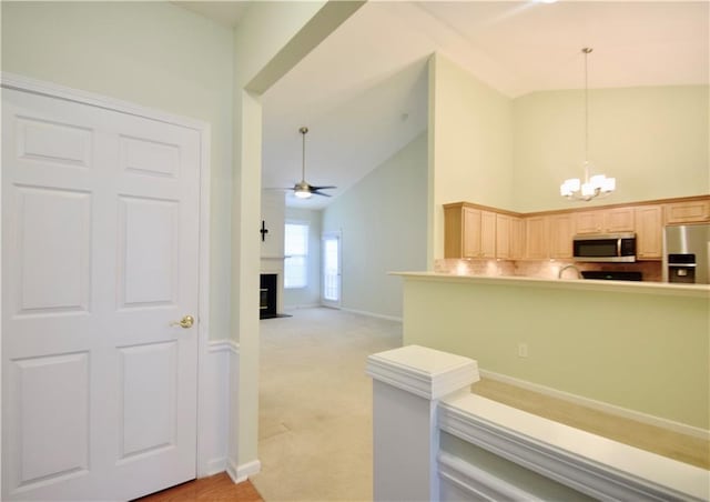 179 Camry Ln, Grayson, GA 30017 - corridor with a chandelier, high vaulted ceiling, baseboards, and light colored carpet