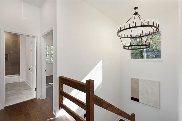 60 Newcastle St SW, Atlanta, GA 30314 - stairway with plenty of natural light, a chandelier, and wood finished floors