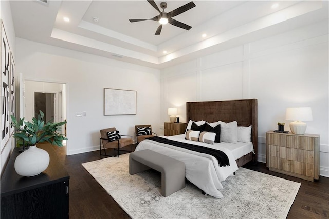 60 Newcastle St SW, Atlanta, GA 30314 - bedroom featuring a tray ceiling, dark wood finished floors, recessed lighting, and a ceiling fan