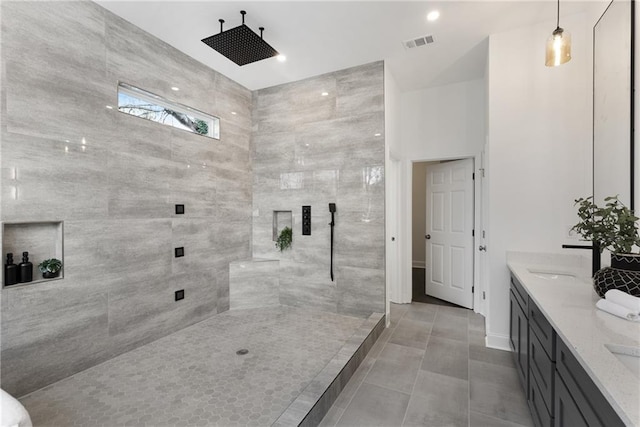 60 Newcastle St SW, Atlanta, GA 30314 - bathroom featuring vanity, tiled shower, and tile patterned floors