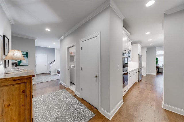 corridor featuring crown molding, stairway, light wood-type flooring, baseboards, and recessed lighting