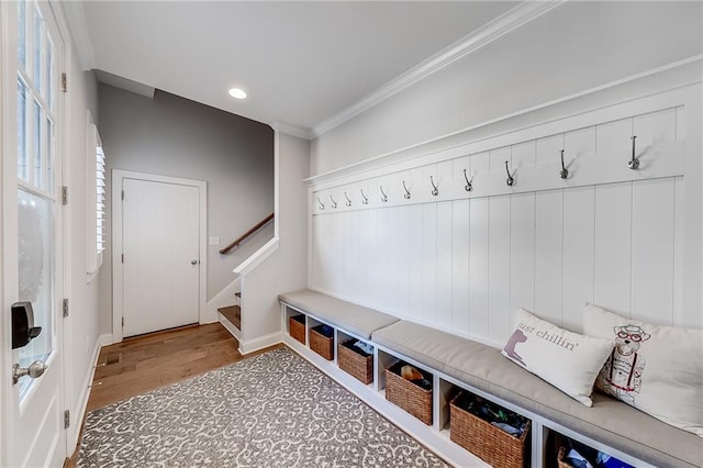 mudroom featuring crown molding, wood finished floors, recessed lighting, and baseboards
