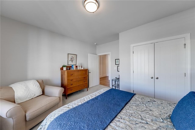 bedroom featuring a closet and carpet
