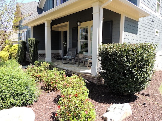 view of patio featuring covered porch