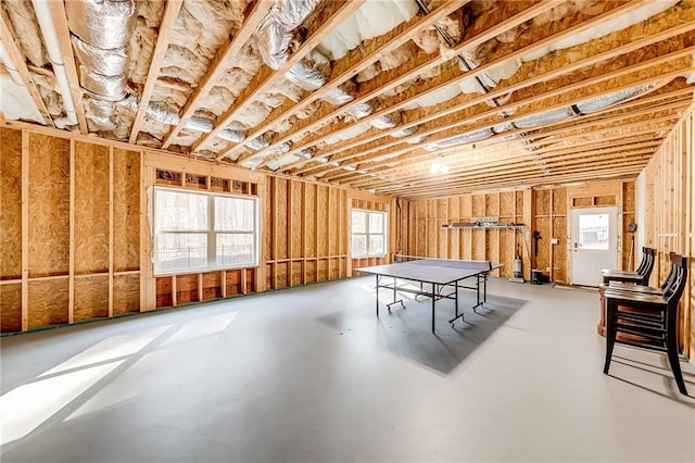 recreation room with concrete floors