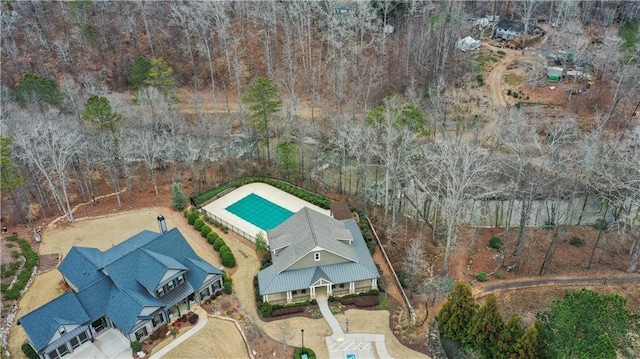 aerial view of property's location with a pool area