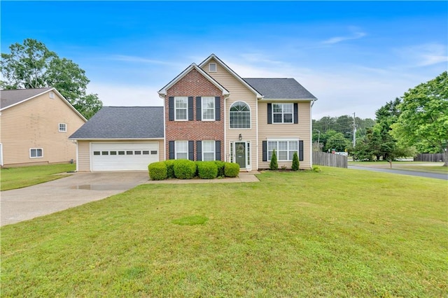 colonial-style house featuring driveway and an attached garage