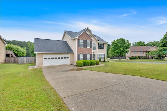 view of front of property featuring concrete driveway and a garage