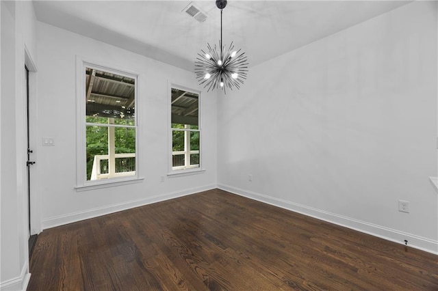 1217 Cabin Bridge Rd, Bethlehem, GA 30620 - unfurnished dining area with a chandelier, dark wood finished floors, and baseboards