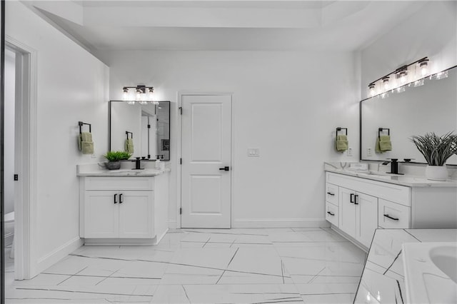 1217 Cabin Bridge Rd, Bethlehem, GA 30620 - bathroom with marble look tiles, baseboards, two vanities, and a tub