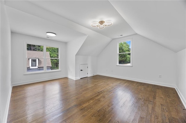 1217 Cabin Bridge Rd, Bethlehem, GA 30620 - bonus room featuring dark wood-style flooring, vaulted ceiling, and baseboards