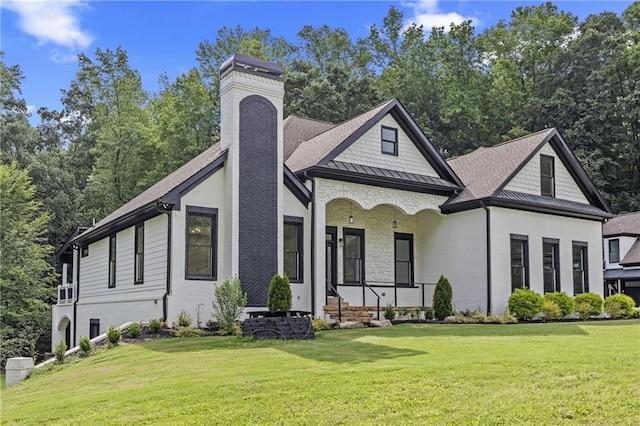 1217 Cabin Bridge Rd, Bethlehem, GA 30620 - view of front of house featuring a front lawn, brick siding, and a porch