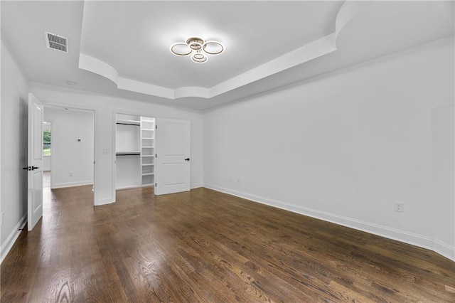 1217 Cabin Bridge Rd, Bethlehem, GA 30620 - unfurnished bedroom with a raised ceiling, baseboards, dark wood finished floors, and a closet