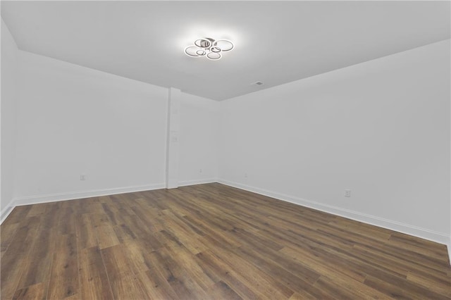 1217 Cabin Bridge Rd, Bethlehem, GA 30620 - spare room with dark wood-style floors and baseboards