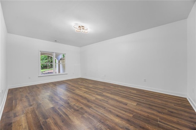1217 Cabin Bridge Rd, Bethlehem, GA 30620 - spare room featuring dark wood-type flooring and baseboards