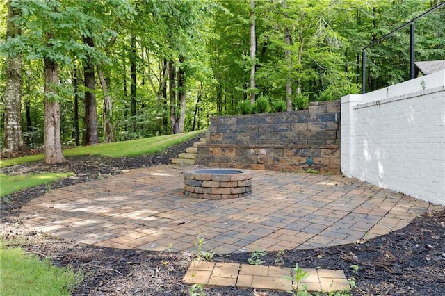 1217 Cabin Bridge Rd, Bethlehem, GA 30620 - view of patio featuring a fire pit