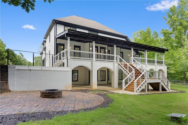 1217 Cabin Bridge Rd, Bethlehem, GA 30620 - back of property featuring stairway, a fire pit, a patio area, and a lawn