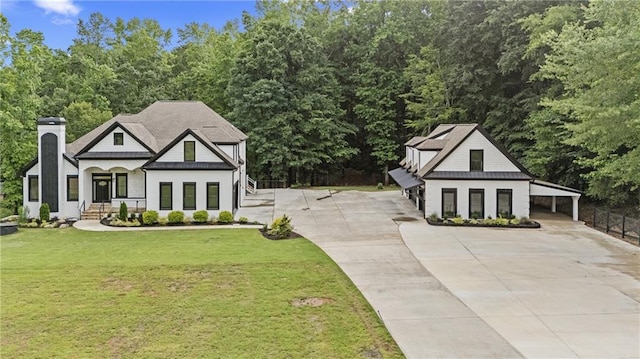 1217 Cabin Bridge Rd, Bethlehem, GA 30620 - modern inspired farmhouse with driveway, a front lawn, a standing seam roof, metal roof, and a chimney