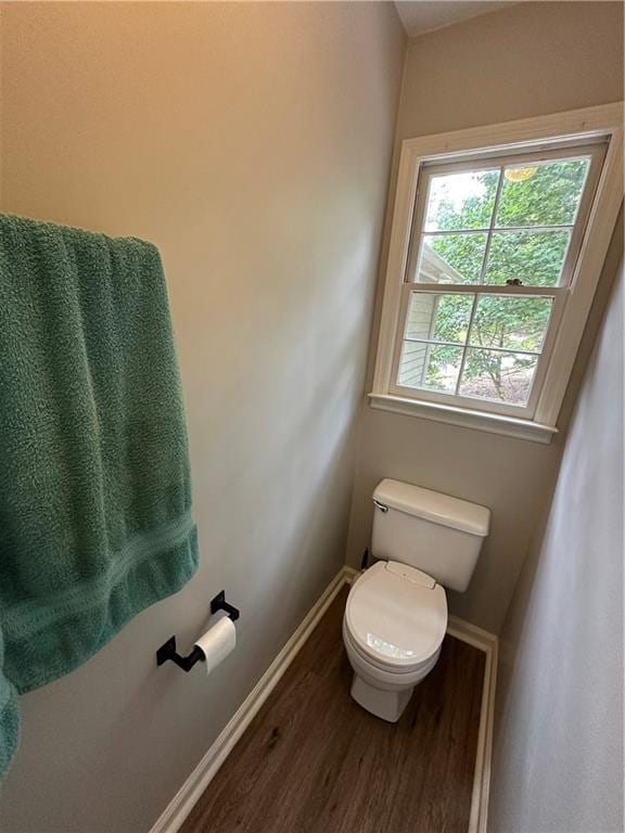3962 Fox Glen Dr, Woodstock, GA 30189 - bathroom featuring wood finished floors and toilet