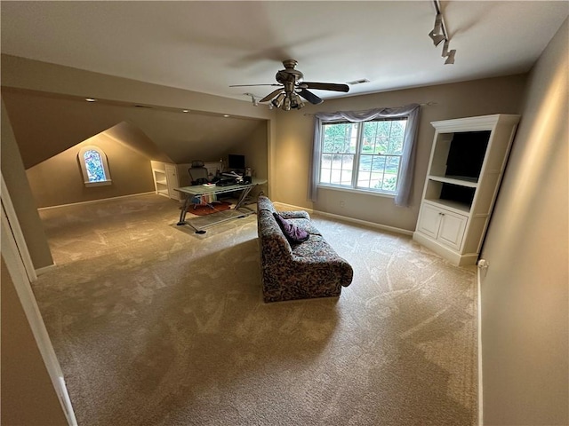 3962 Fox Glen Dr, Woodstock, GA 30189 - carpeted bedroom with an office area, rail lighting, lofted ceiling, and a ceiling fan