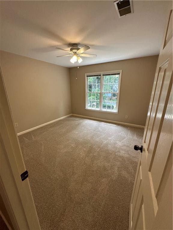 3962 Fox Glen Dr, Woodstock, GA 30189 - carpeted empty room featuring a ceiling fan and baseboards